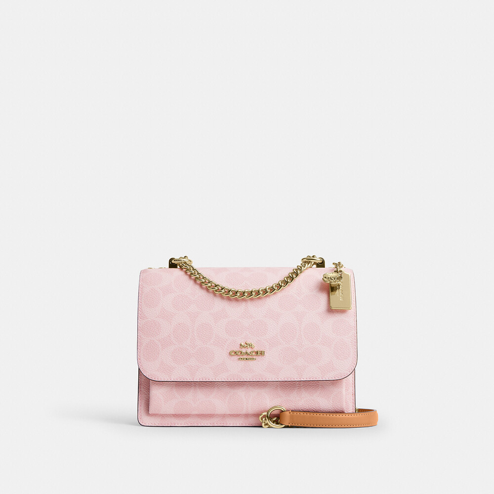 Coach Outlet Klare Crossbody Bag In Signature Canvas With Charms